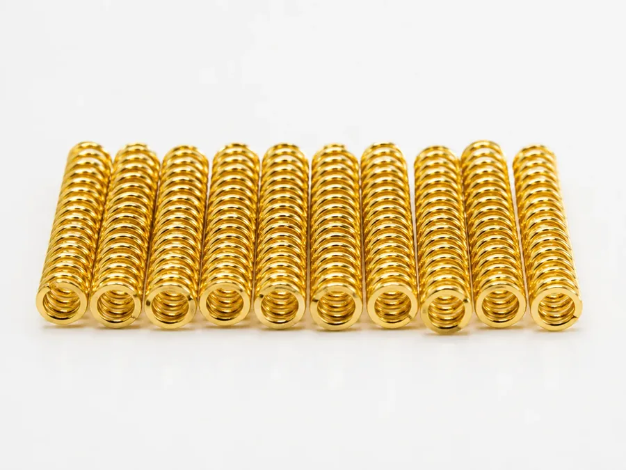 Banho de ouro — Molas com revestimento de ouro para contato elétrico, tratamento realizado pela Artec Galvanotécnica